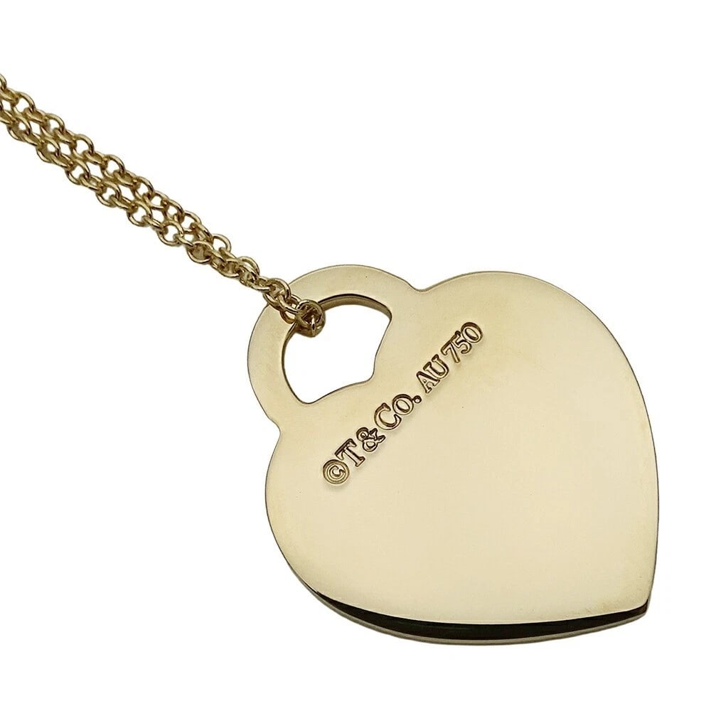TIFFANY & CO RETURN TO HEART TAG NECKLACE 18K GOLD DIAMOND: Tiffany & Co Return to Heart Tag Necklace 18K Gold Diamond Brand: Tiffany & Co. Type: Necklace Material: 750 Yellow Gold, Main Stone/Creation Natural Color: Yellow Gold Size: Pendant approx. 19.6 mm (