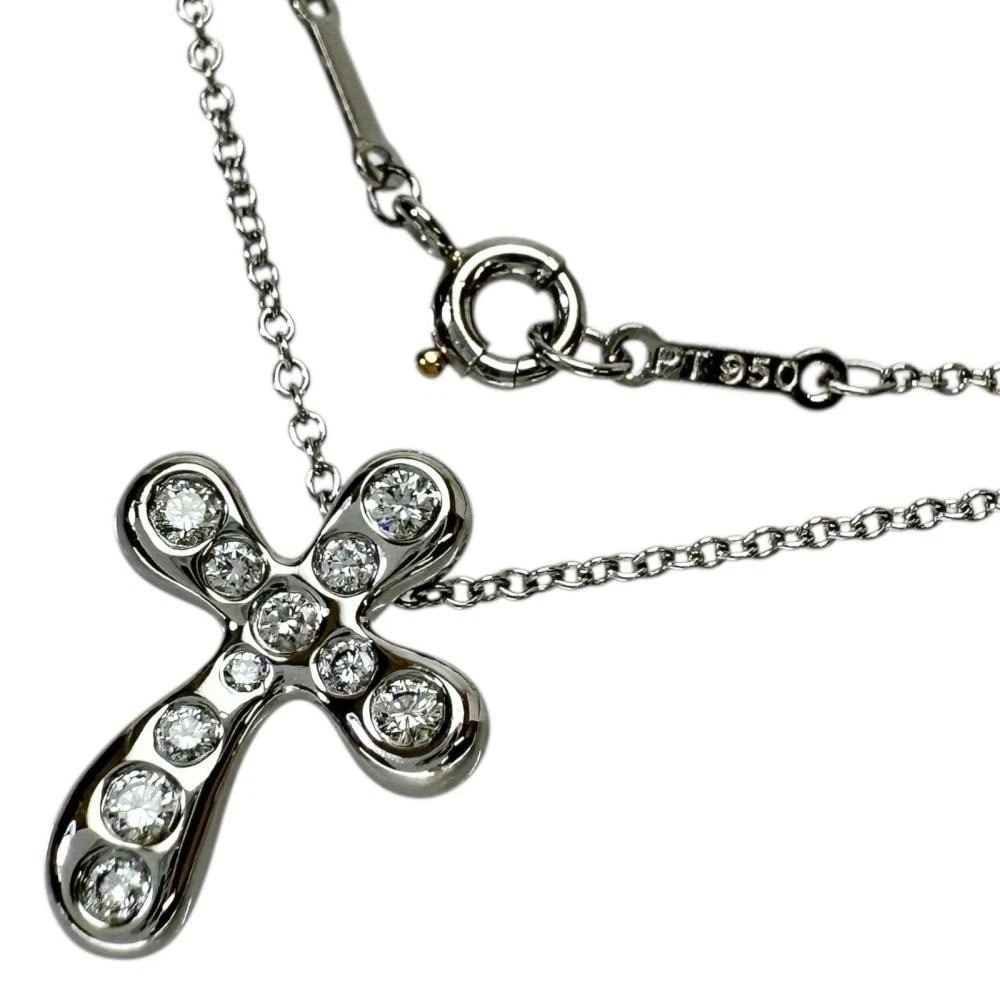 TIFFANY & CO. DOTS CROSS DIAMOND NECKLACE PT950: Tiffany & Co. Dots Cross Diamond Necklace Pt950 Brand: Tiffany & Co. Type: Necklace Material: Platinum 950, Main Stone/Creation natural Color: Silver Size: Chain Length: Approx. 16.34 in (41.5 cm) Pen