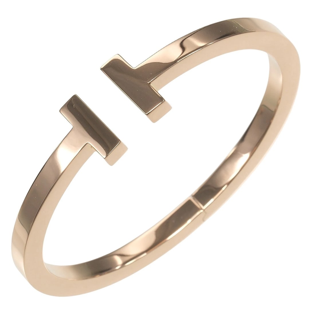 TIFFANY & CO T SQUARE BRACELET 18K ROSE GOLD: Tiffany & Co T Square Bracelet 18K Rose Gold Brand: Tiffany & Co. Type: Bracelet Material: 18k Pink Gold, Color: Pink Gold Size: Inner Circumference approx 16.3 cm (6.4 inches) Accessories: None <