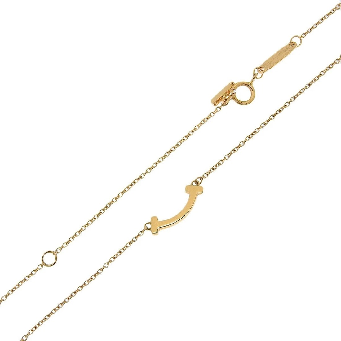 TIFFANY & CO. T SMILE PENDANT NECKLACE K18YG: Tiffany & Co. T Smile Pendant Necklace K18YG Brand: Tiffany & Co. Type: Necklace Material: 18k Yellow Gold, Color: Pink Gold Size: Width: Approx. 0.47 inches (1.2 cm) Chain Length: AdjUS table 15.94��