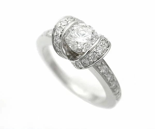 TIFFANY & CO. DIAMOND RIBBON RING PT950: Tiffany & Co. Diamond Ribbon Ring Pt950 Brand: Tiffany & Co. Type: Ring Material: Platinum950, Main Stone/Creation Natural Color: Platinum Size: US : 2.75–3 Accessories: None Accessories N