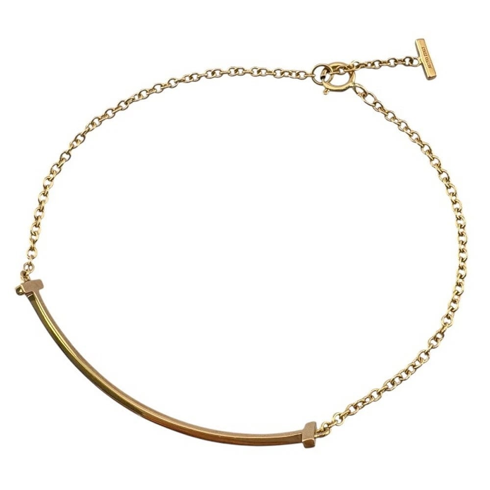 TIFFANY & CO. T SMILE BRACELET 18K PINK GOLD: Tiffany & Co. T Smile Bracelet 18K Pink Gold Brand: Tiffany & Co. Type: Bracelet Material: 18k Pink Gold, Color: Gold x Pink Gold Size: Length: Approx. 6.89 inches (17.5cm) AdjUS ter Ring Position: Ap