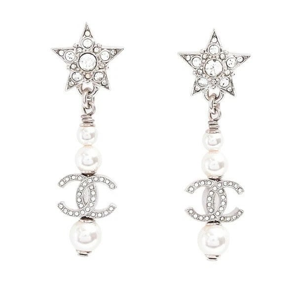CHANEL STAR FAUX PEARL RHINESTONE DROP EARRINGS: Chanel Star Faux Pearl Rhinestone Drop Earrings Brand: CHANEL Type: Earrings Material: Brass, Main Stone/Creation Faux Pearl Secondary Stone: Rhinestone Color: Size: Size: Approx. 1.68 x 0.54 inches (