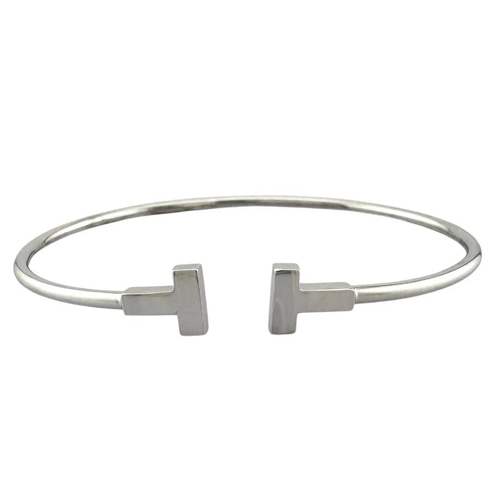 TIFFANY & CO. BANGLE 18K WHITE GOLD: Tiffany & Co. Bangle 18K White Gold Brand: Tiffany & Co. Type: Bracelet Material: 18k White Gold, Color: White Gold Size: Circumference: Approx. 5.91 inches (15.0 cm) Width (Max): Approx. 0.28 inches