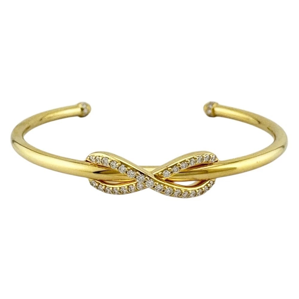 TIFFANY & CO. 18K YELLOW GOLDBRACELET: Tiffany & Co. 18K Yellow GoldBracelet Brand: Tiffany & Co. Type: Bracelet Material: 18k Yellow Gold, Main Stone/Creation Natural Color: Yellow Gold Size: Circumference: Approx. 5.71 inches (14.5 cm)