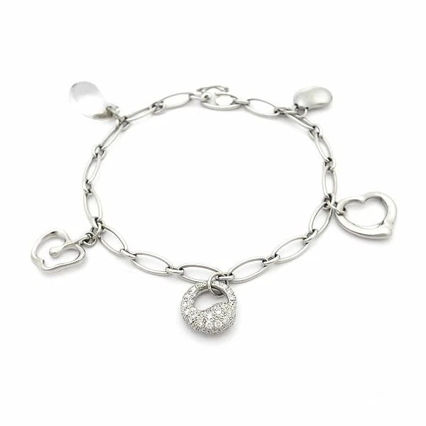 TIFFANY & CO. FIVE CHARM BRACELET PT950: Tiffany & Co. Five Charm Bracelet Pt950 Brand: Tiffany & Co. Type: Bracelet Material: Platinum950, Main Stone/Creation Natural Color: Platinum Size: Approx. 7.48 inches Inner circumference approx. 7.0