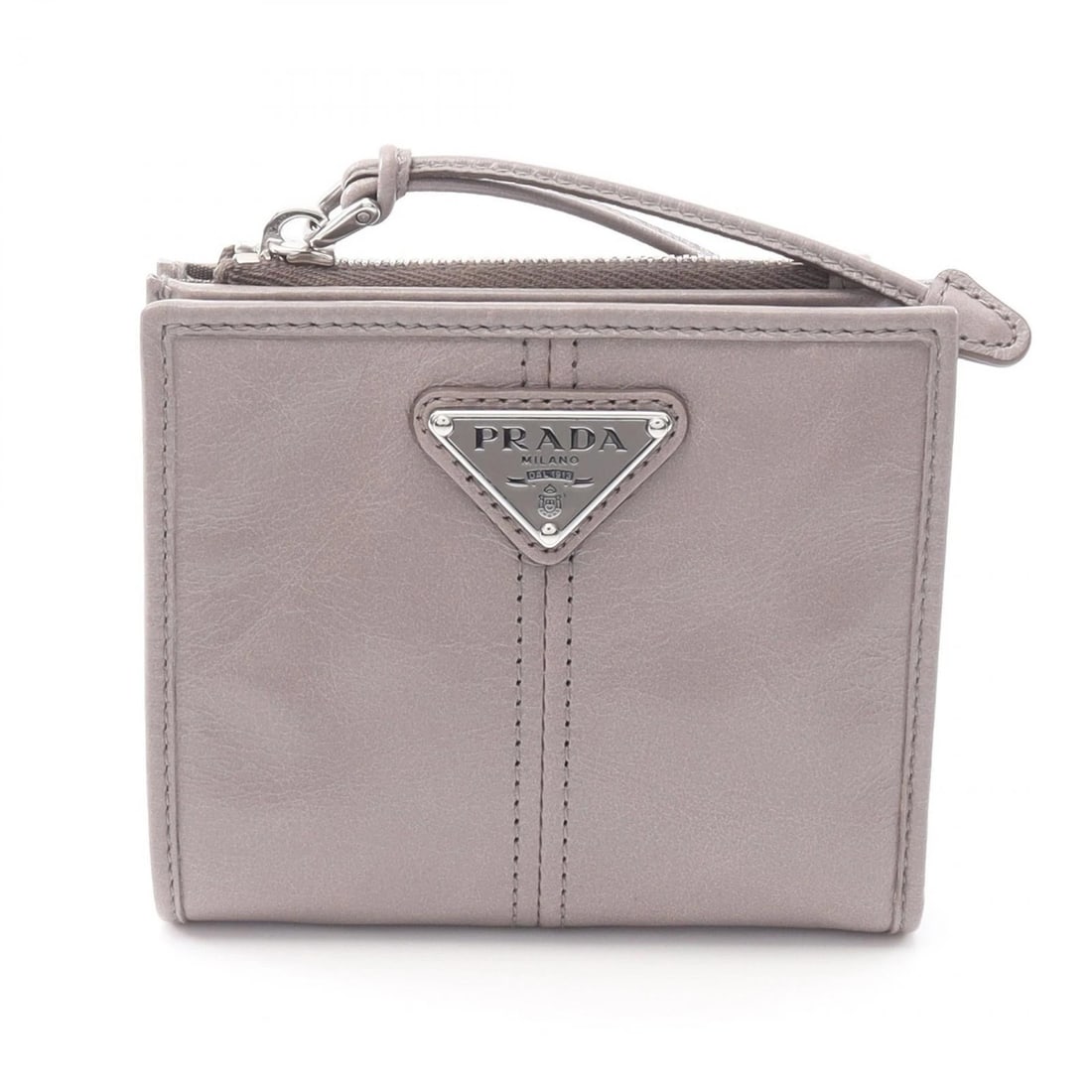 PRADA SOFT LUX BI-FOLD WALLET: PRADA Soft Lux Bi-fold Wallet Brand: PRADA Type: Bi-fold wallet Material: leather Color: Gray??ish colors Size: (H:3.5" x W:4.1"x D:1.0) Accessories: None Accessories Notice: When purchasi