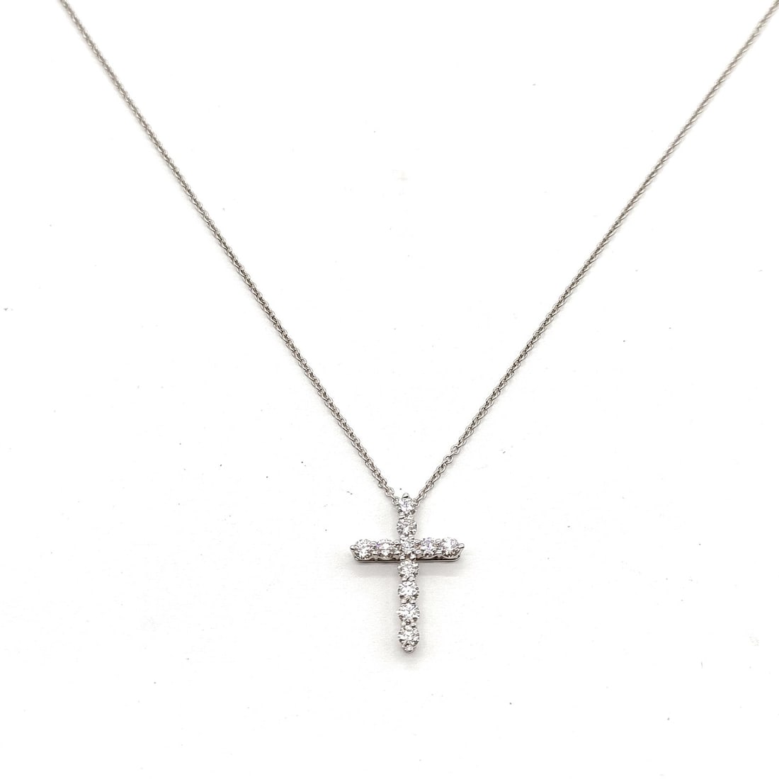 TIFFANY AND CO. NECKLACE SMALL CROSS NATURAL DIAMOND PLATINUM: Tiffany and Co. Necklace Small cross Natural Diamond Platinum Brand: Tiffany and Co. Type: Necklace Material: Platinum, Color: Platinum Size: Pendant Size : 1.84X1.3 cm / 0.72X0.51 inch Chain Size : 4