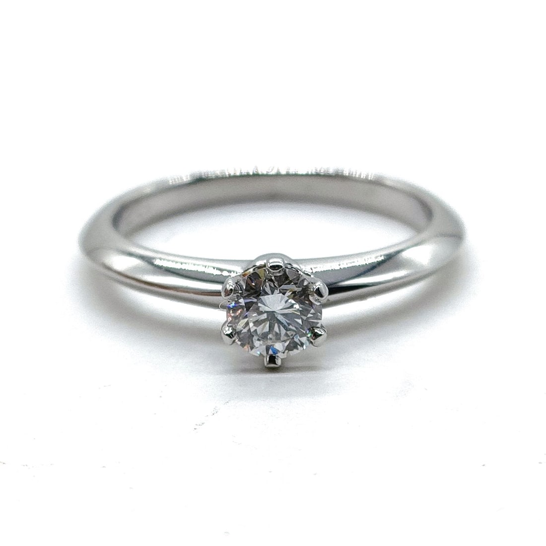 TIFFANY AND CO. RING SOLITAIRE NATURAL DIAMOND PLATINUM: Tiffany and Co. Ring Solitaire Natural Diamond Platinum Brand: Tiffany and Co. Type: Ring Material: Platinum, Color: Platinum Size: US 4 1/8 Accessories: None Accessories Notice: When purchasing