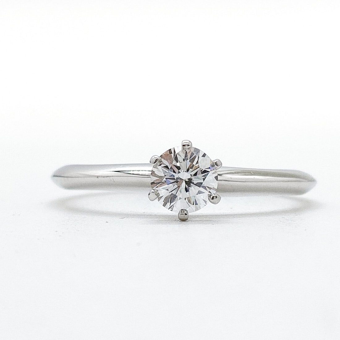 TIFFANY AND CO. RING SOLITAIRE NATURAL DIAMOND PLATINUM: Tiffany and Co. Ring Solitaire Natural Diamond Platinum Brand: Tiffany and Co. Type: Ring Material: Platinum, Color: Platinum Size: US 5 3/4 Accessories: None Accessories Notice: When purchasing