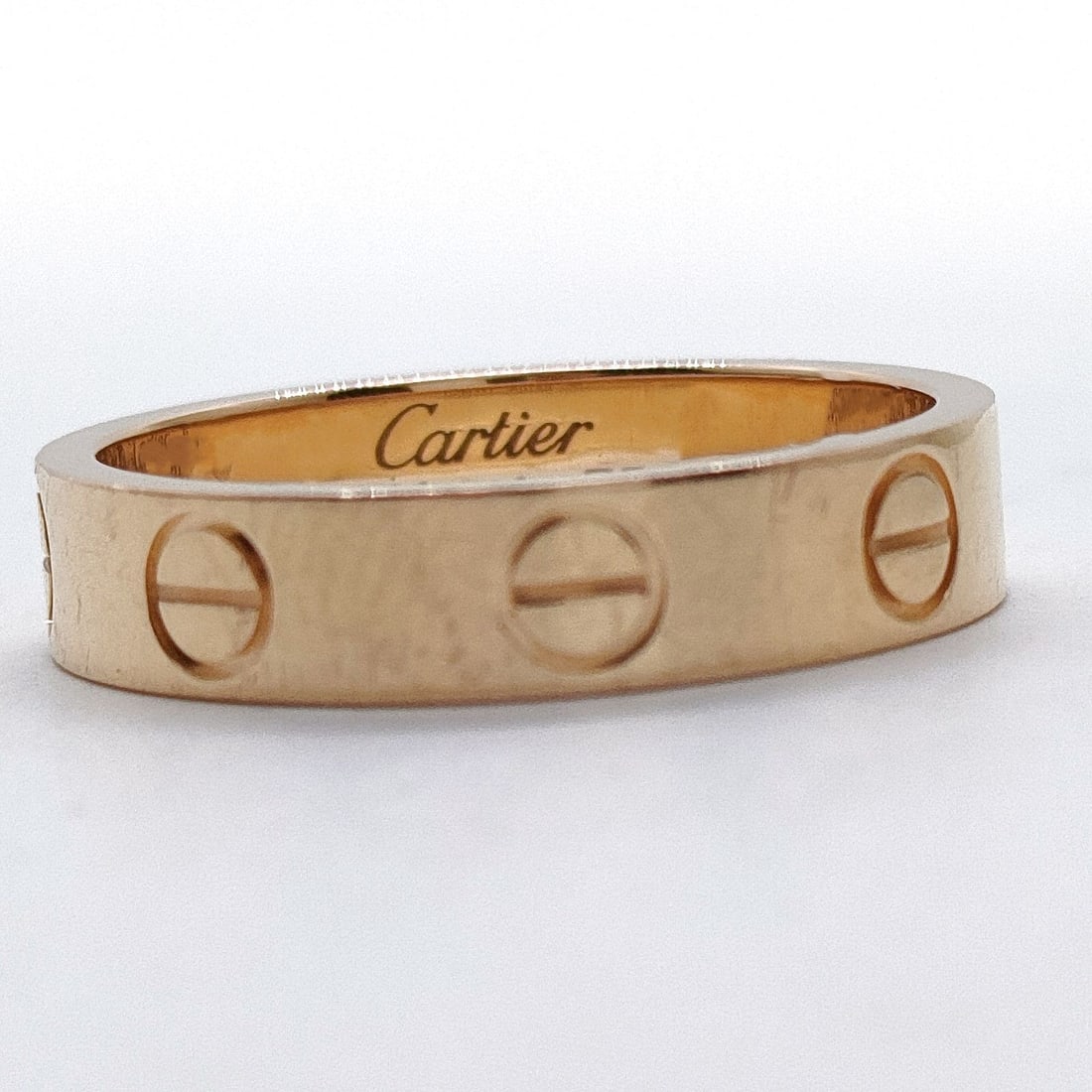 CARTIER RING MINI LOVE GOLD YELLOW GOLD: Cartier Ring Mini love Gold Yellow Gold Brand: Cartier Type: Ring Material: Gold, Color: Yellow Gold Size: US 4 1/8 Accessories: None Accessories Notice: When purchasing pre-owned goods, p