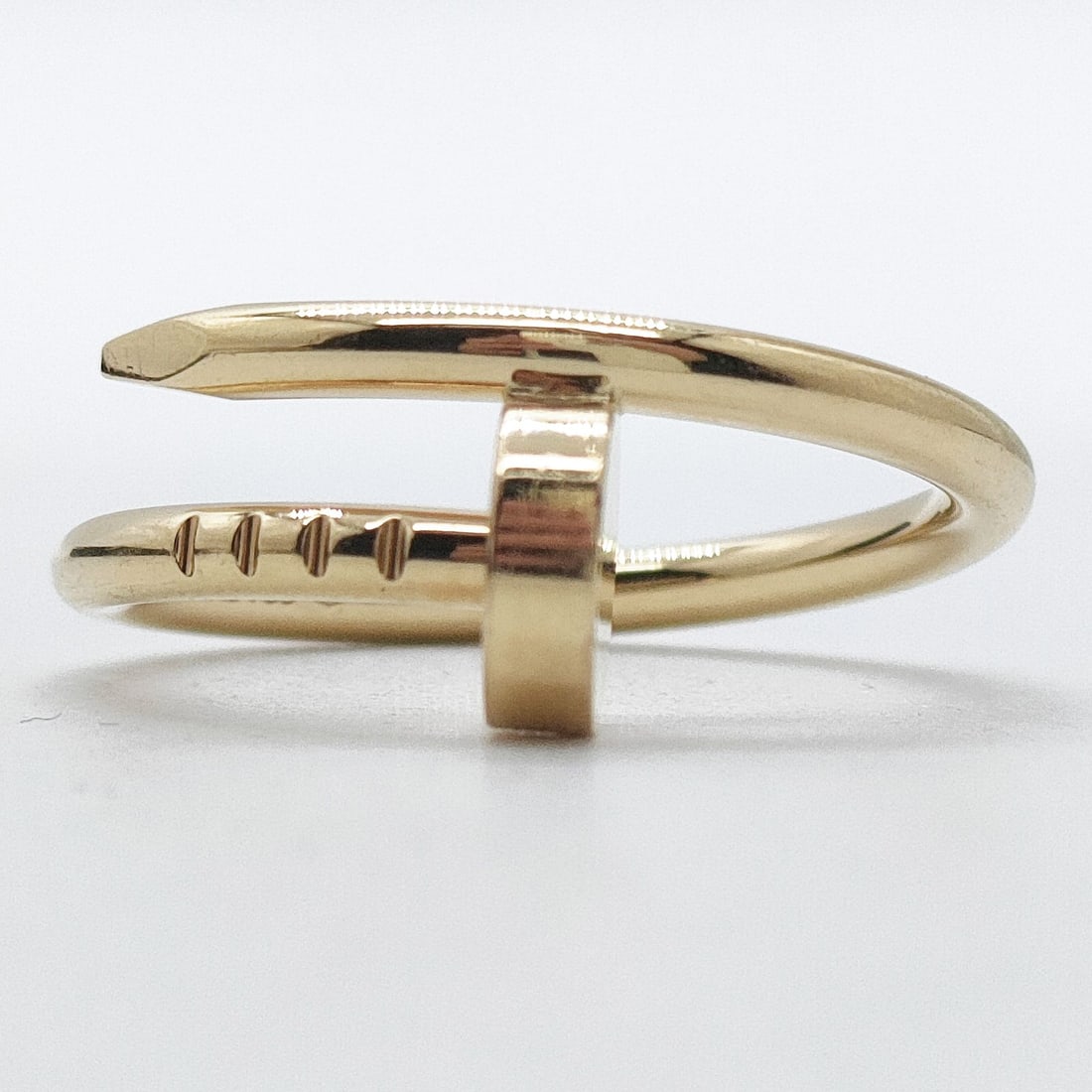 CARTIER RING JUSTE UN CLOU GOLD YELLOW GOLD: Cartier Ring Juste un Clou Gold Yellow Gold Brand: Cartier Type: Ring Material: Gold, Color: Yellow Gold Size: US 5 Accessories: None Accessories Notice: When purchasing pre-owned goods, p