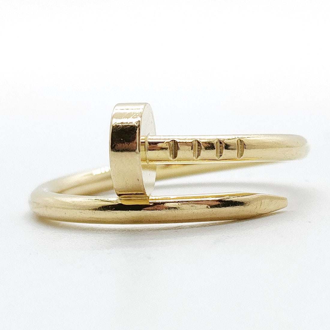 CARTIER RING JUSTE UN CLOU GOLD YELLOW GOLD: Cartier Ring Juste un Clou Gold Yellow Gold Brand: Cartier Type: Ring Material: Gold, Color: Yellow Gold Size: US 5 3/4 Accessories: None Accessories Notice: When purchasing pre-owned good