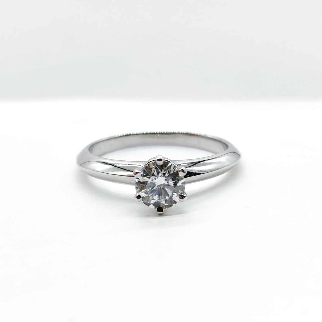 TIFFANY AND CO. RING SOLITAIRE NATURAL DIAMOND PLATINUM: Tiffany and Co. Ring Solitaire Natural Diamond Platinum Brand: Tiffany and Co. Type: Ring Material: Platinum, Color: Platinum Size: US 5 3/4 Accessories: None Accessories Notice: When purc