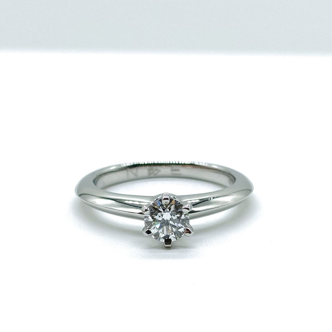 TIFFANY AND CO. RING SOLITAIRE NATURAL DIAMOND: Tiffany and Co. Ring Solitaire Natural Diamond Brand: Tiffany and Co. Type: Ring Material: Platinum, Color: Platinum Size: US 4 1/4 Accessories: None Accessories Notice: When purchasing pr
