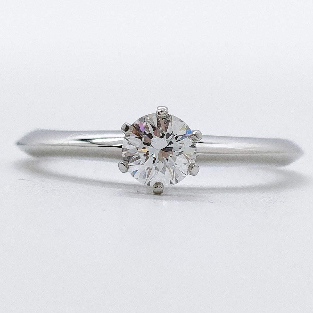 TIFFANY AND CO. RING SOLITAIRE NATURAL DIAMOND: Tiffany and Co. Ring Solitaire Natural Diamond Brand: Tiffany and Co. Type: Ring Material: Platinum, Color: Platinum Size: US 4 1/2 Accessories: None Accessories Notice: When purchasing pr