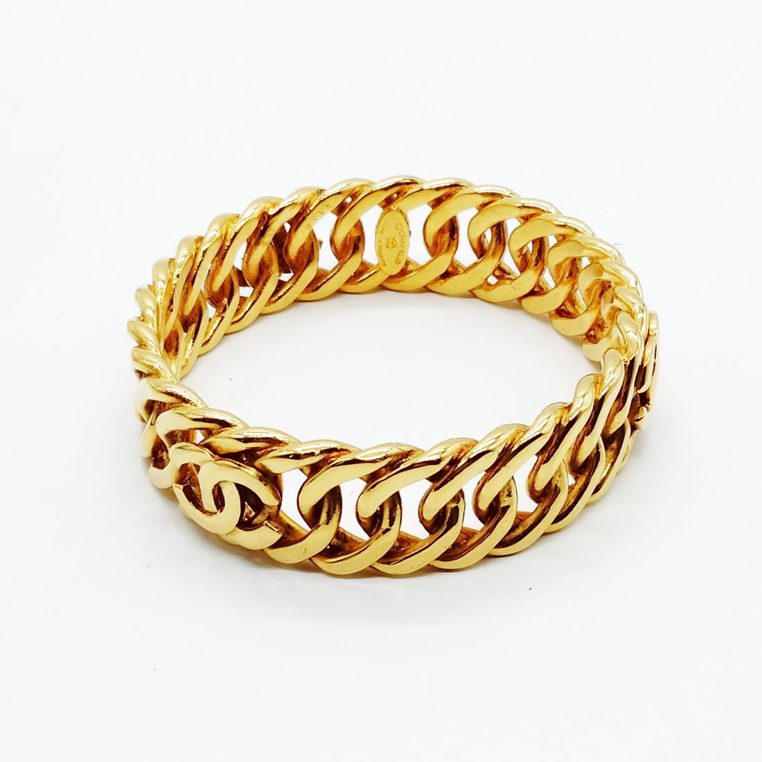 CHANEL BANGLE GOLD: Chanel Bangle Gold Brand: Chanel Type: Bangle Material: Metal, Color: Gold Size: Full Length : 20.5 cm (approx) Accessories: None Accessories Notice: When purchasing pre-owned goods, please refer to