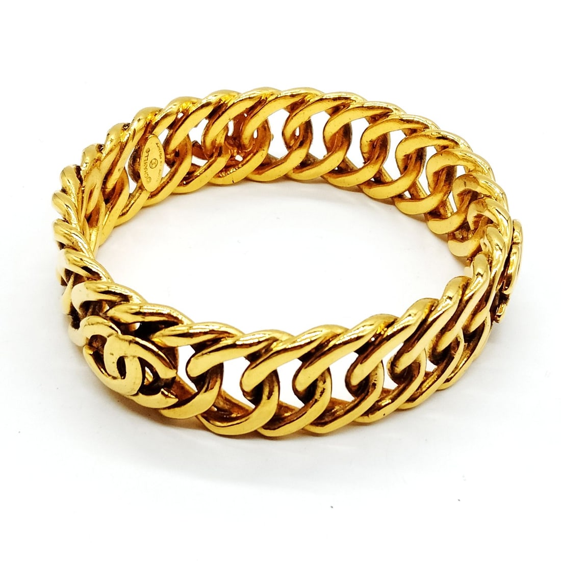 CHANEL BANGLE GOLD: Chanel Bangle Gold Brand: Chanel Type: Bangle Material: Metal, Color: Gold Size: Full Length : 21 cm (approx) Accessories: None Accessories Notice: When purchasing pre-owned goods, please refer to