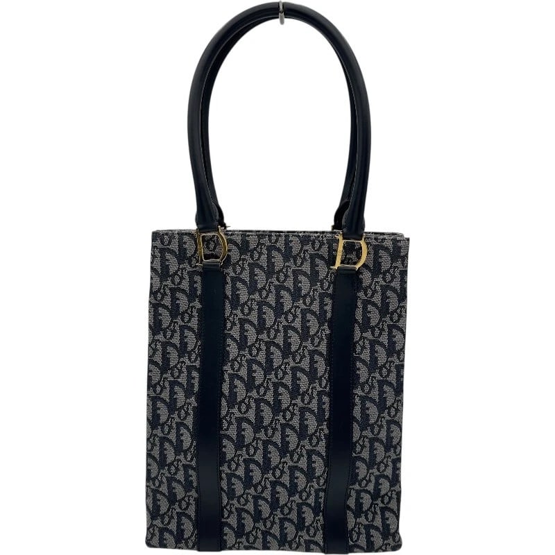 CHRISTIAN DIOR TROTTER TOTE TOTE BAG: Christian Dior trotter tote Tote Bag Brand: Christian Dior Type: Tote Bag Material: Jacquard Color: Navy Gold Hardware Size: W25cm x H32.5cmx D8cm W9.8 x H12.8x D3.1inch Accessories: None