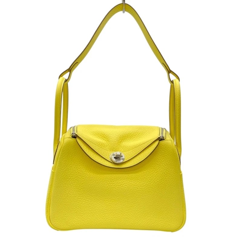HERMES LINDY 26 SHOULDER BAG: HERMES Lindy 26 Shoulder Bag Brand: HERMES Type: Shoulder Bag Material: Taurillon Clemence Color: Limoncello SilverHardware Size: W26cm x H17cmx D13cm W10.2 x H6.7x D5.1inch Accessories: None