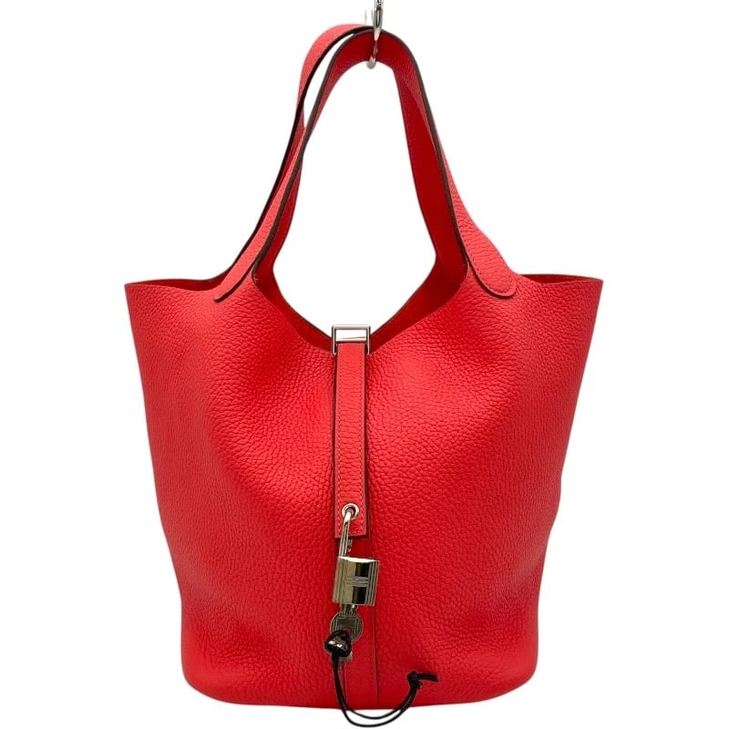 HERMES PICO TAN LOCK MM HANDBAG: HERMES Pico Tan Lock MM Handbag Brand: HERMES Type: Handbag Material: Taurillon Clemence Color: Rose Texas SVHardware Size: W22cm x H22cmx D17.5cm W8.7 x H8.7x D6.9inch Accessories: None A