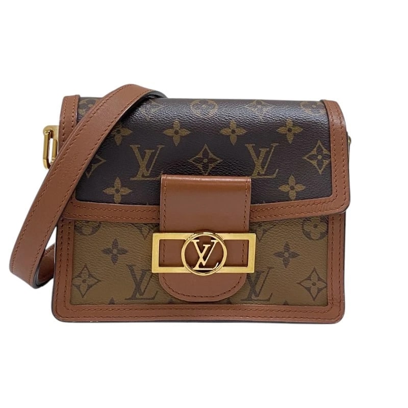 LOUIS VUITTON DAUFINE MINI SHOULDER BAG: LOUIS VUITTON Daufine MINI Shoulder Bag Brand: LOUIS VUITTON Type: Shoulder Bag Material: Monogram reverse canvas Color: Brown Gold Hardware Size: W20cm x H15cmx D9cm W7.9 x H5.9x D3.5inch Accesso