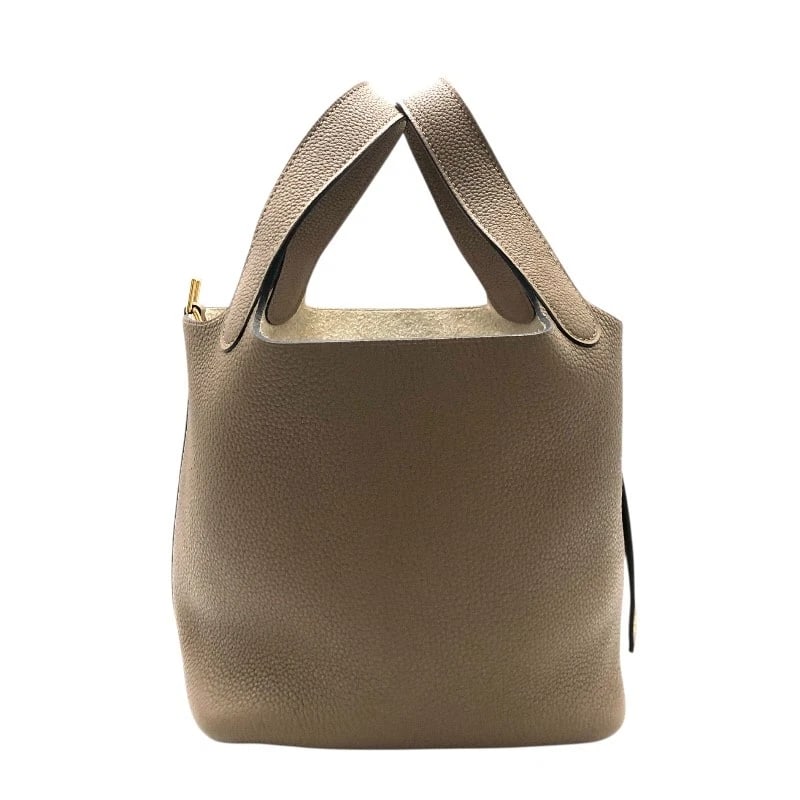 HERMES PICOTAN LOCK PM HANDBAG: HERMES Picotan Lock PM Handbag Brand: HERMES Type: Handbag Material: Taurillon Clemence Maurice Color: Beige de Weimar Size: W18cm x H19cmx D14cm W7.1 x H7.5x D5.5inch Accessories: None Ac