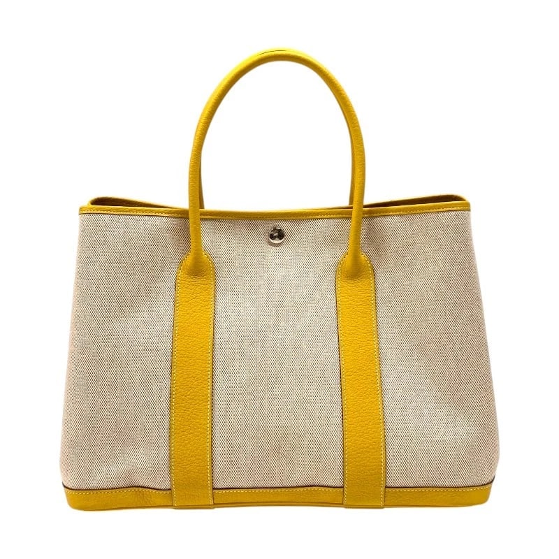 HERMES GARDEN PARTY PM TOTE BAG: HERMES Garden party PM Tote Bag Brand: HERMES Type: Tote Bag Material: Toile / Negonda Color: Beige x yellow Size: W36cm x H26cmx D16cm W14.2 x H10.2x D6.3inch Accessories: None Accessorie