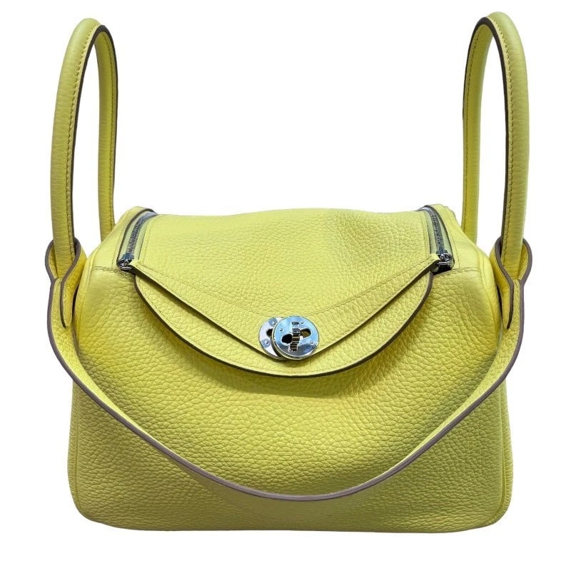 HERMES LINDY 26 SHOULDER BAG: HERMES Lindy 26 Shoulder Bag Brand: HERMES Type: Shoulder Bag Material: Taurillon Clemence Color: Limoncello xSilverHardware Size: W26cm x H19cmx D13cm W10.2 x H7.5x D5.1inch Accessories: None