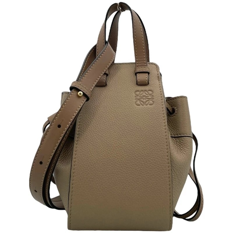 LOEWE HAMMOCK DRAWSTRING MINI SHOULDER BAG: LOEWE Hammock drawstring mini Shoulder Bag Brand: LOEWE Type: Shoulder Bag Material: Calfskin Color: beige Size: W14cm x H19cmx D10.5cm W5.5 x H7.5x D4.1inch Accessories: None Accessories