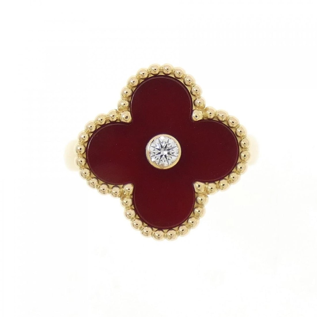VAN CLEEF & ARPELS ALHAMBRA RING: Van Cleef & Arpels Alhambra Ring Brand: Van Cleef & Arpels Type: Ring Material: 750 yellow gold, Main Stone/Creation Carnelian Secondary Stone Natural Color: yellow gold Size: US 4 1/2 Accessories