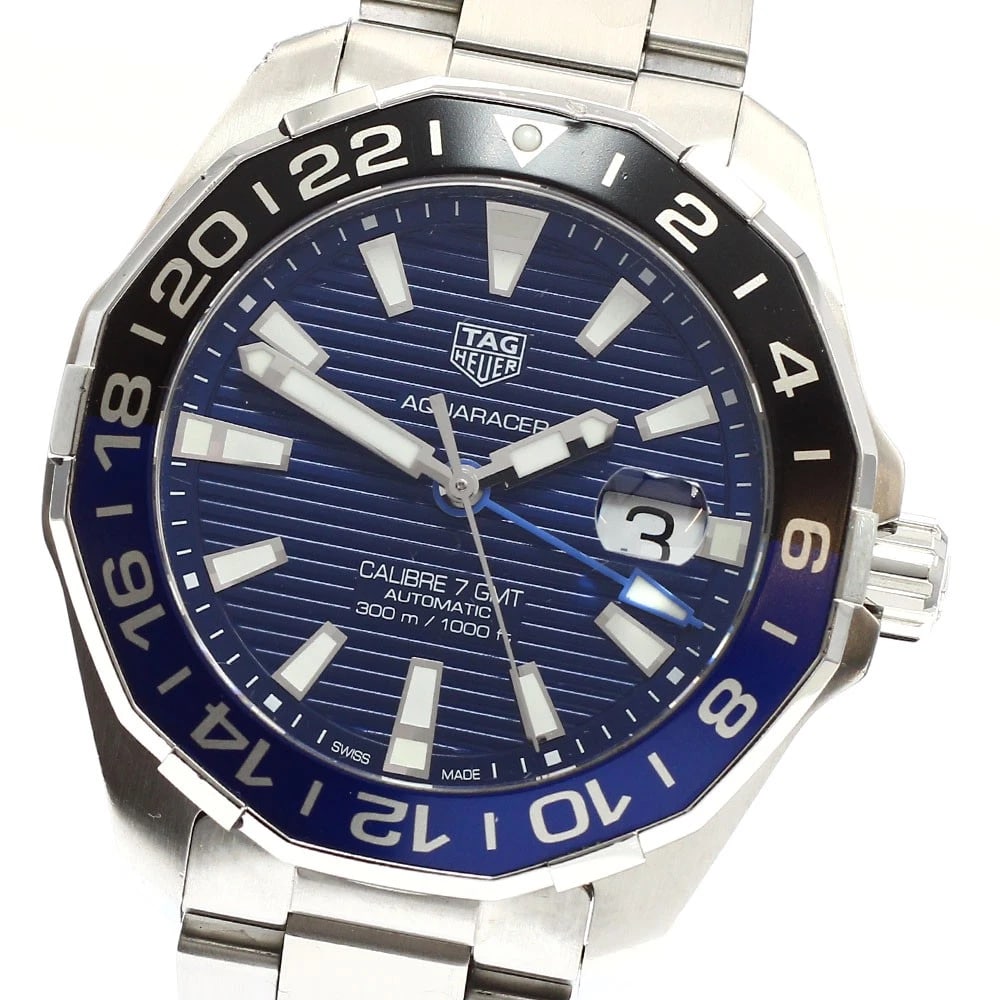 TAG HEUER AQUA RACER CALIBER AUTOMATIC WATCH: TAG HEUER Aqua racer Caliber automatic Watch Brand: TAG HEUER Type: Wristwatch Material: Band Material Stainless Steel, Case Material Stainless Steel Color: Band Color Silver, Dial Colorblue, Case