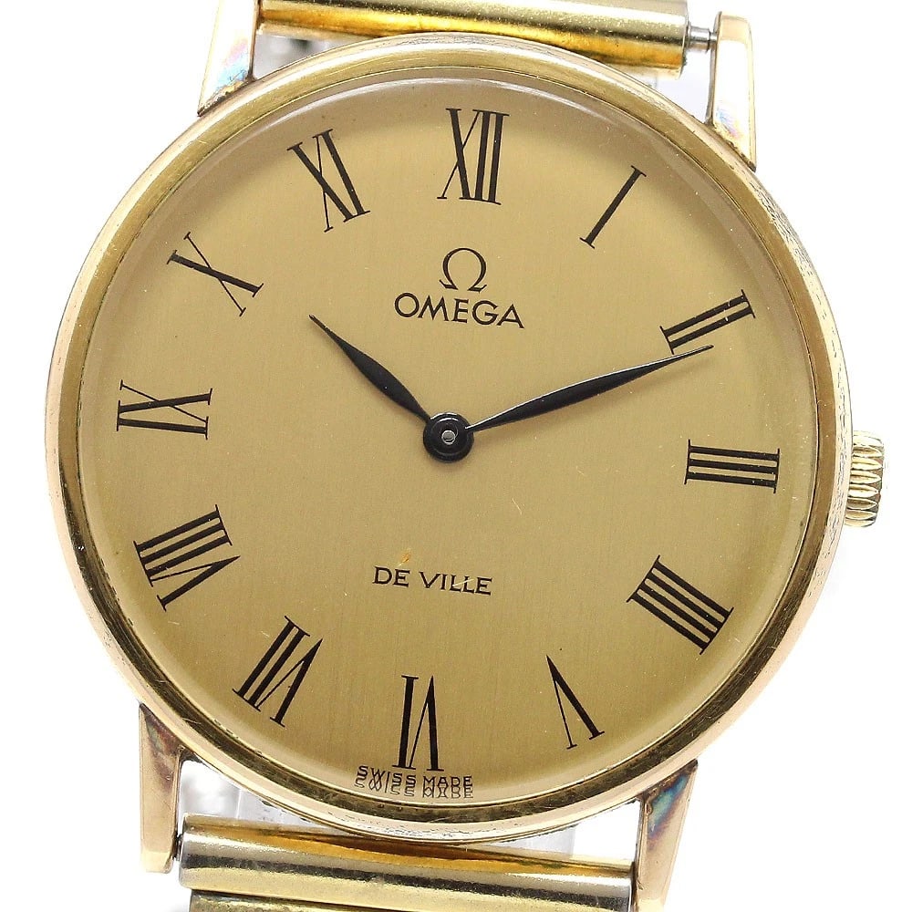 OMEGA DE VILLE GOLD WATCH: OMEGA De Ville gold Watch Brand: OMEGA Type: Wristwatch Material: Band Material Stainless Steel/Gold Plated, Case Material Stainless Steel/Gold Plated Color: Band Color Gold / Silver, Dial Colorgold, 