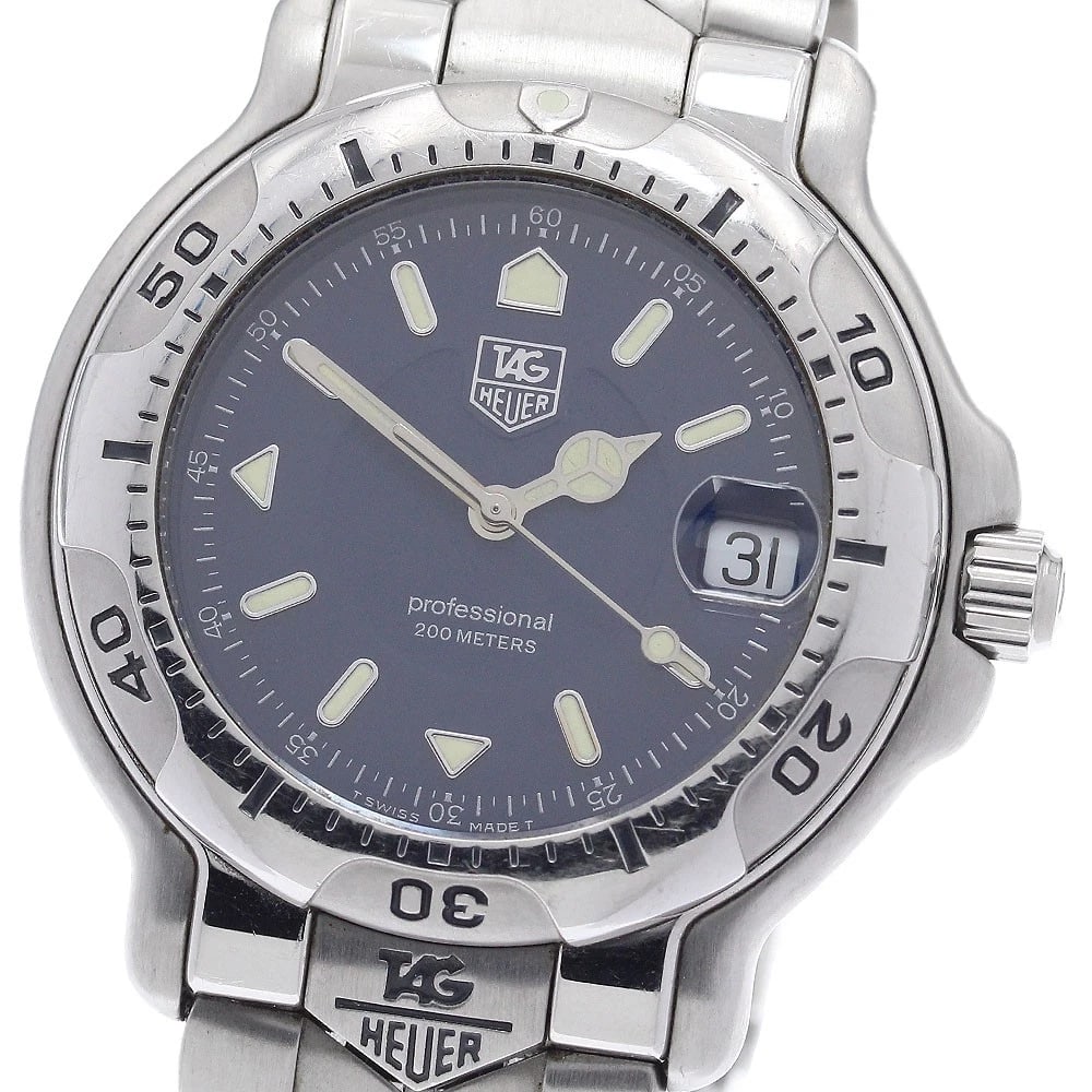 TAG HEUER PROFESSIONAL NAVY QUARTZ WATCH: TAG HEUER Professional Navy Quartz Watch Brand: TAG HEUER Type: Wristwatch Material: Band Material Stainless Steel, Case Material Stainless Steel Color: Band Color Silver, Dial ColorNavy, Case ColorSi