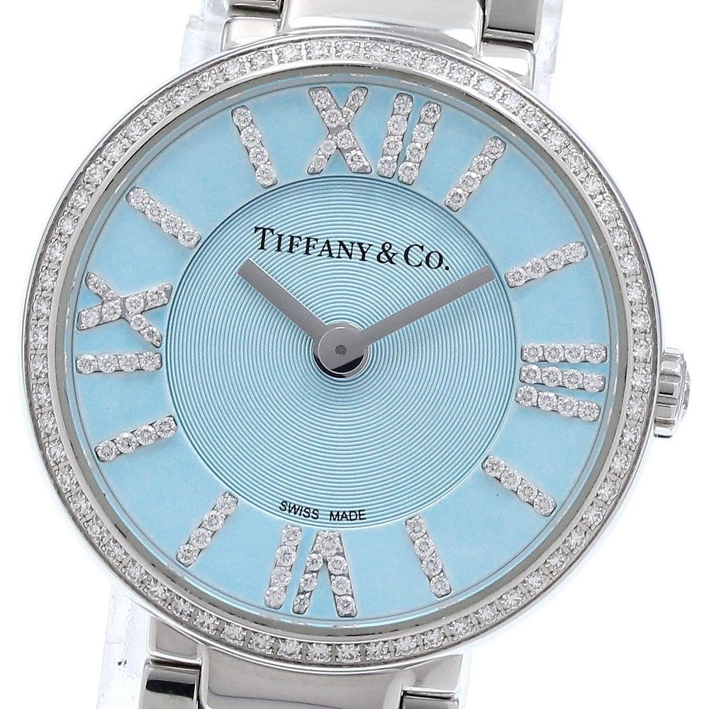 TIFFANY&CO DIAMOND BEZEL QUARTZ WATCH: TIFFANY&Co Diamond Bezel Quartz Watch Brand: TIFFANY&Co. Type: Wristwatch Material: Band Material Stainless Steel, Case Material Stainless Steel Color: Band Color Silver, Dial Colorblue, Case