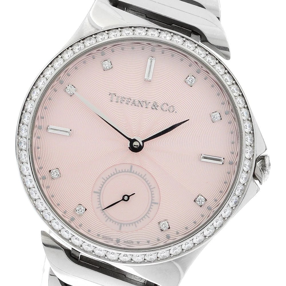 TIFFANY&CO DIAMOND BEZEL AUTOMATIC WATCH: TIFFANY&Co diamond bezel Automatic Watch Brand: TIFFANY&Co. Type: Wristwatch Material: Band Material Stainless Steel, Case Material Stainless Steel Color: Band Color Silver, Dial Colorpink, Case Color