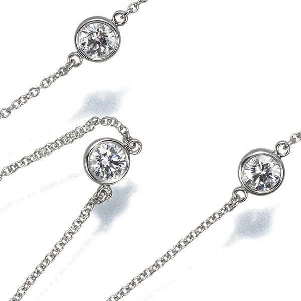 TIFFANY&CO. NECKLACE DIAMONDS BY THE YARD DIAMOND: Tiffany&Co. Necklace Diamonds By The Yard Diamond Brand: Tiffany & Co. Type: Necklace Material: 950 / Platinum, Main Stone/Creation NATURAL; Color: Silver Size: Necklace length: 41cm Pendant size: Dia