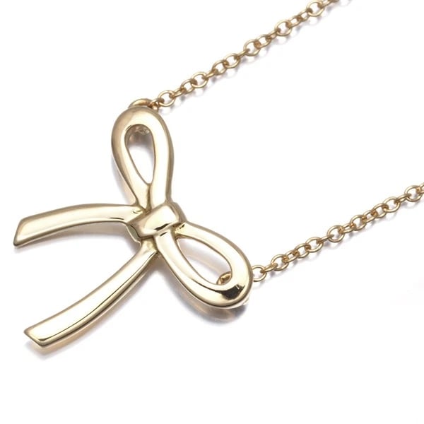 TIFFANY&CO. NECKLACE RIBBON 18K 750 YELLOW GOLD: Tiffany&Co. Necklace Ribbon 18K 750 Yellow Gold Brand: Tiffany & Co. Type: Necklace Material: 18K / 750 / Yellow Gold, Color: Yellow Gold Size: Necklace length: 40cm Pendant size: 14.5 x 14.7mm Ac