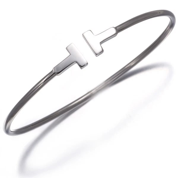 TIFFANY&CO. BRACELET TIFFANY T WIRE NARROW BANGLE: Tiffany&Co. Bracelet Tiffany T Wire Narrow Bangle Brand: Tiffany & Co. Type: Bracelet Material: 18K / 750 / White Gold , Color: White gold Size: Inner circumference: 15cm Design width: 6.8mm Acces