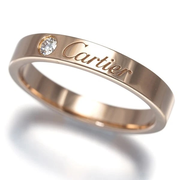 CARTIER RING DIAMOND C DE CARTIER WEDDING BAND: Cartier Ring Diamond C de Cartier Wedding Band Brand: Cartier Type: Ring Material: 18K / 750 / Rose Gold, Main Stone/Creation NATURAL Color: Rose Gold Size: US 5.25 - 5.5 Accessories: None