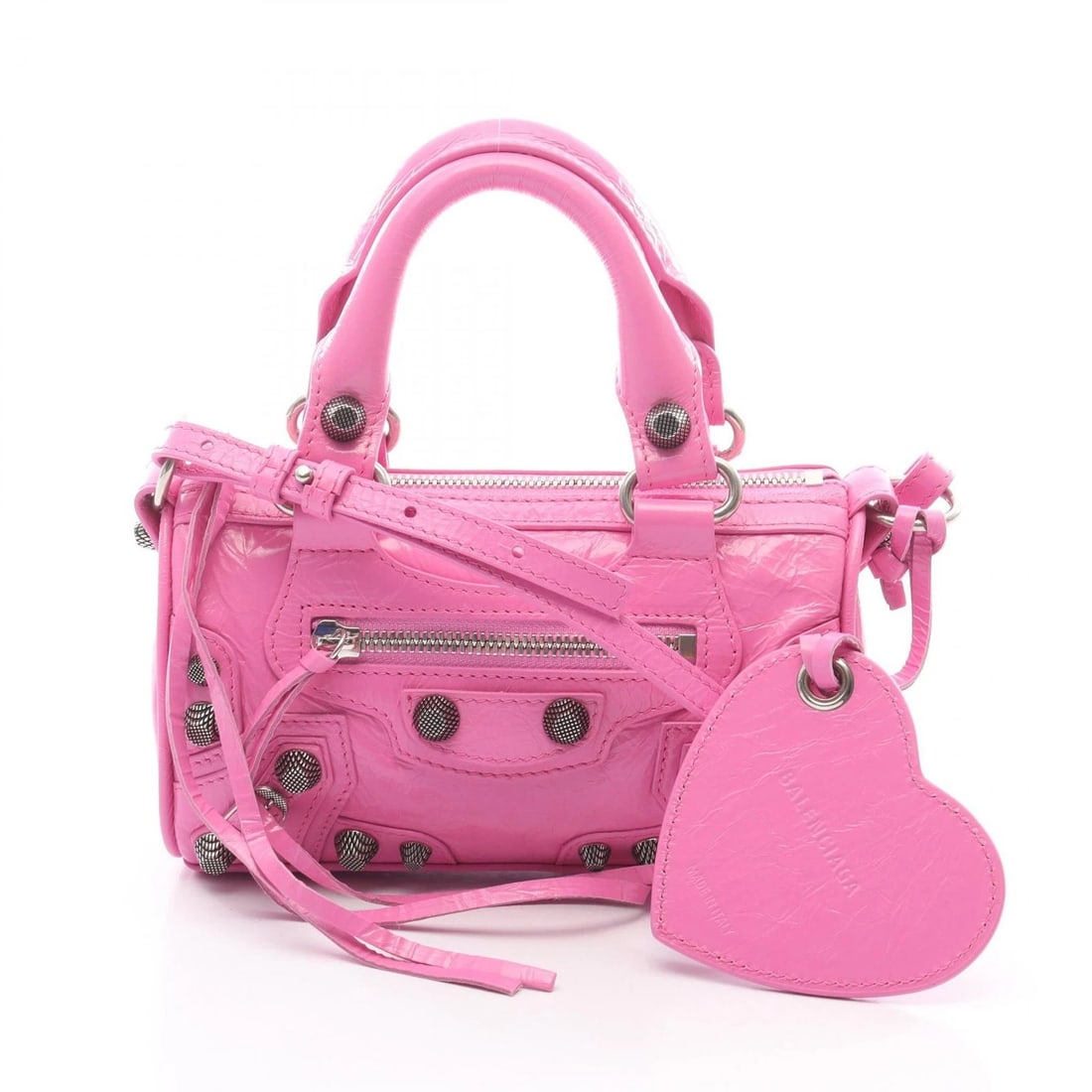 BALENCIAGA LE CAGOLE NANO DUFFEL SHOULDER CROSSBODY HAND BAG: BALENCIAGA Le Cagole Nano Duffel Shoulder Crossbody Hand bag Brand: BALENCIAGA Type: Handbag Material: leather Color: Pink??ish colors Size: H:10cm x W:18cm x D:7cm (H:3.9" x W:7.1" x D:2.8") Acce