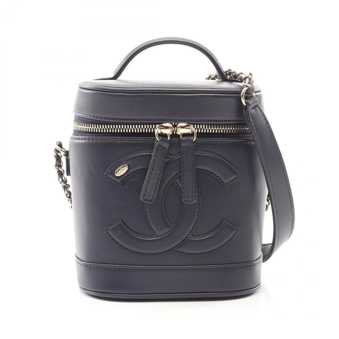 CHANEL COCO MARK VANITY CROSSBODY HANDBAG: CHANEL COCO Mark Vanity Crossbody Handbag Brand: CHANEL Type: Handbag Material: Lambskin (sheep leather) Color: Navy??ish colors Size: H:16cm x W:14cm x D:11.5cm (H:6.3" x W:5.5" x D:4.5") Handle?12cm