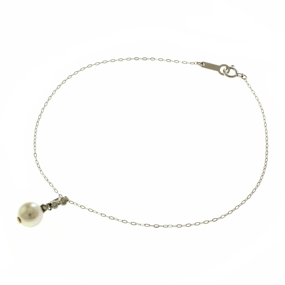 4? BRACELET K18 WHITE GOLD PEARL DIAMOND: 4? Bracelet K18 white gold Pearl diamond Brand: 4? Type: Bracelet Material: K18 white gold, Main Stone/Creation Pearl/diamond Color: Silver Size: (CM) Total Length:21cm High limit:16.0mm Chain width:0