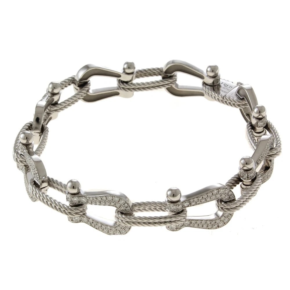 FRED BRACELET K18 WHITE GOLD DIAMOND: FRED Bracelet K18 white gold diamond Brand: FRED Type: Bracelet Material: K18 white gold, Main Stone/Creation Natural Color: Silver Size: (CM) Total Length:20cm High limit:12.5mm (Inch) Total Length:7