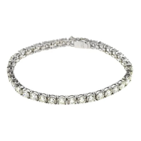 PT900/ PT850 DIAMOND TENNIS BRACELET: Pt900/ Pt850 Diamond Tennis Bracelet Brand: None Type: bracelets Material: Pt900/ Pt850, Main Stone/Creation Natural Color: Silver Size: Length/Width/Diameter (CM)4.4 Accessories: None Accessories
