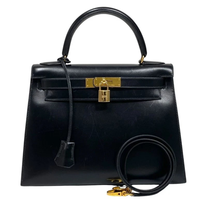 HERMES KELLY 28 HANDBAG: HERMES Kelly 28 Handbag Brand: HERMES Type: Handbag Material: Box scarf Color: Black Gold Hardware Size: W28.5cm x H21.5cmx D11cm W11.2 x H8.5x D4.3inch Accessories: None Accessories Notice: When