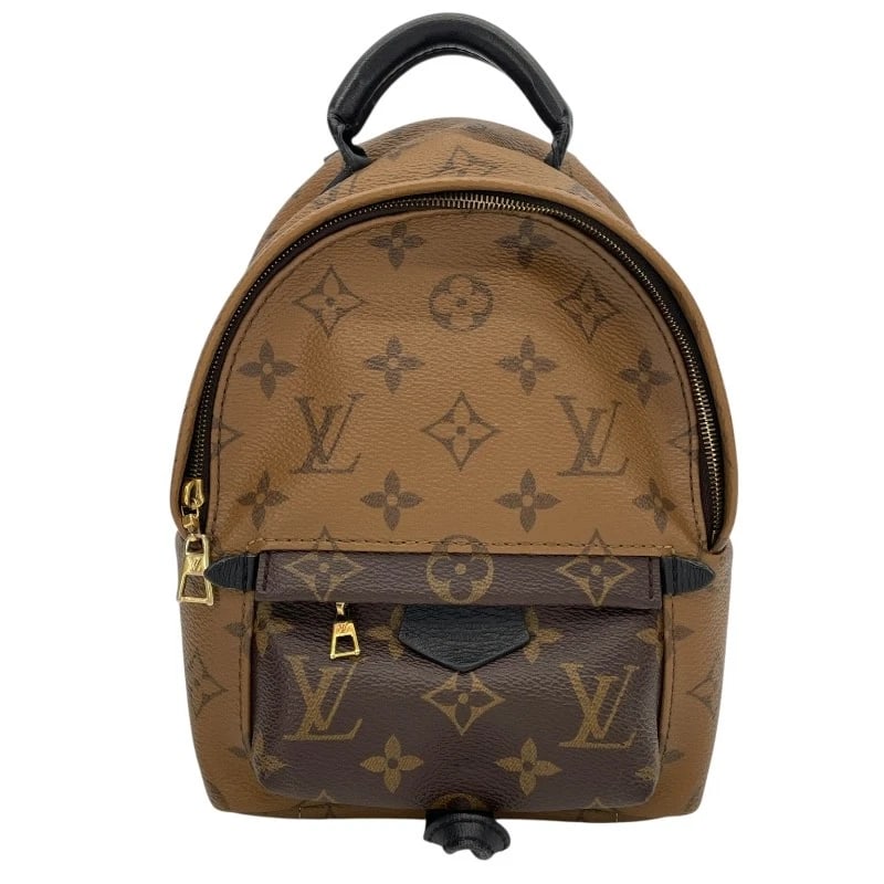 LOUIS VUITTON PALM SPRINGS BACKPACK: LOUIS VUITTON Palm Springs Backpack Brand: LOUIS VUITTON Type: Backpack Â· Daypack Material: Monogram reverse Color: Brown Size: W16cm x H22cmx D8.5cm W6.3 x H8.7x D3.3inch Accessories: None <