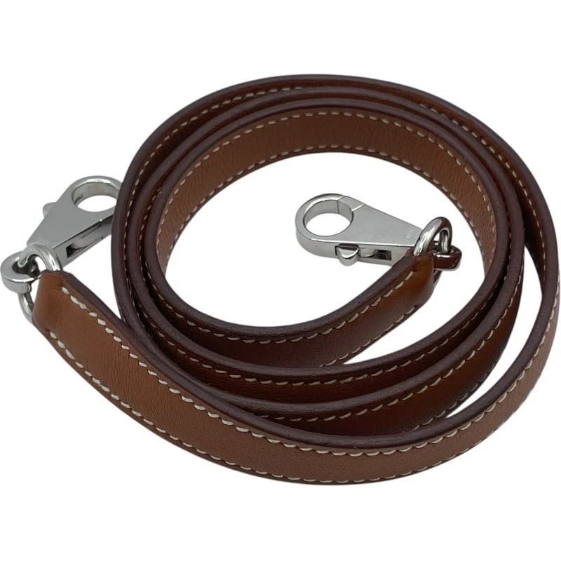 HERMES STRAP SHOULDER STRAP: HERMES strap Shoulder strap Brand: HERMES Type: Shoulder strap Material: Swift Color: Gold SV Hardware Size: Band Width:1.5cm Band Width:0.6inch Accessories: None Accessories Notice: When