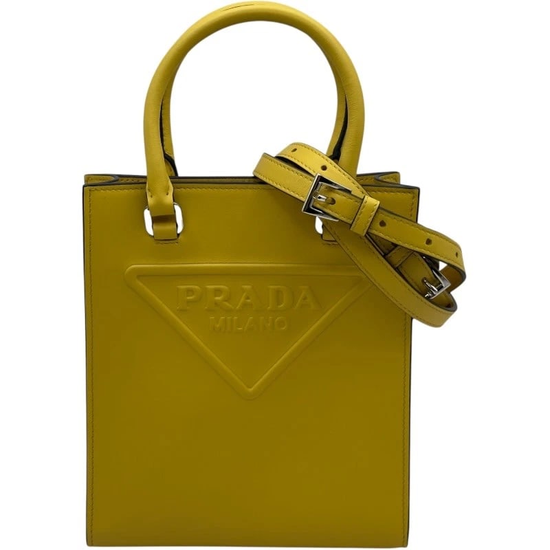 PRADA 2WAY MINI TOTE SHOULDER BAG: PRADA 2WAY mini tote Shoulder Bag Brand: PRADA Type: Shoulder Bag Material: leather Color: Yellow SilverHardware Size: W16.5cm x H19cmx D5.5cm W6.5 x H7.5x D2.2inch Accessories: None Acces