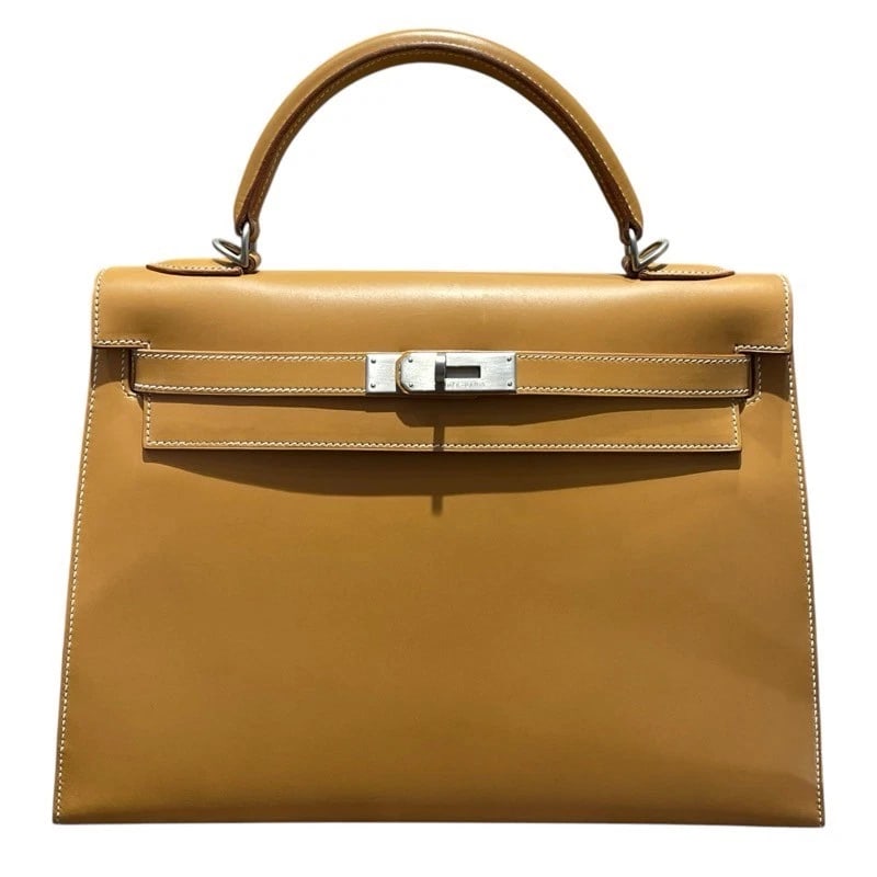 HERMES KELLY 32 SHOULDER BAG: HERMES Kelly 32 Shoulder Bag Brand: HERMES Type: Shoulder Bag Material: Vash Color: Natural Sable Matte Silver Hardware Size: W32cm x H23cmx D12cmW12.6 x H9.1x D4.7inch Accessories: None A